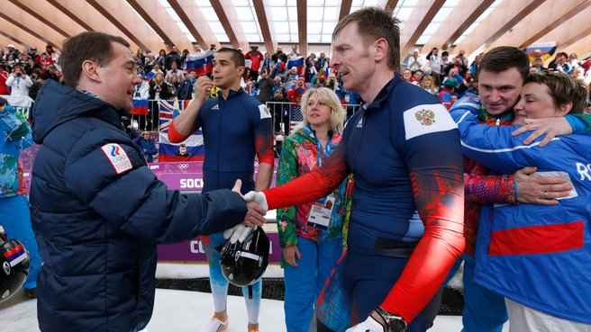 Congratulating Alexander Zubkov for earning a gold medal in the four-man bobsleigh