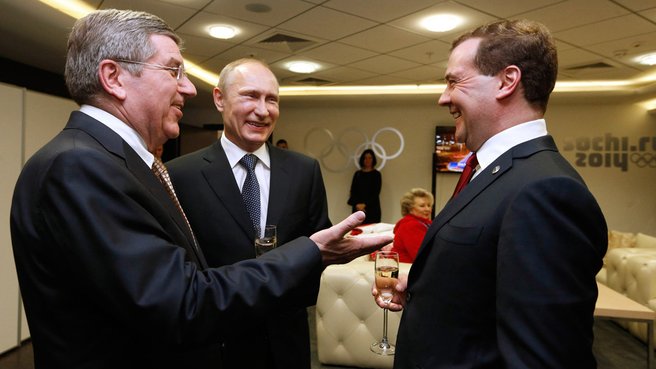 With Russian President Vladimir Putin and IOC President Thomas Bach