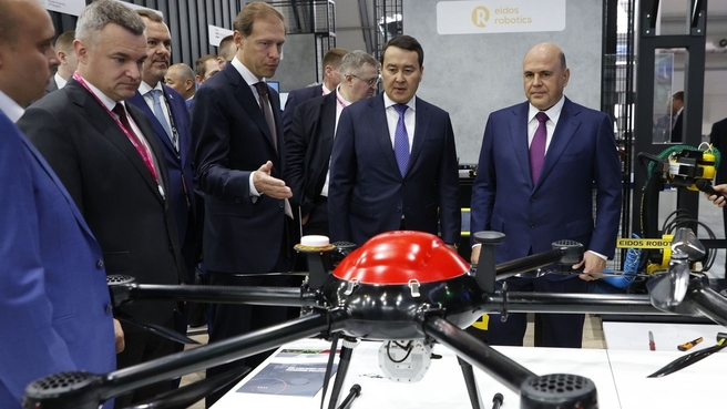 Mikhail Mishustin and Prime Minister of Kazakhstan Alikhan Smailov tour INNOPROM 2022. With Minister of Industry and Trade Denis Manturov. A Gemini quadcopter from the Geoscan Group