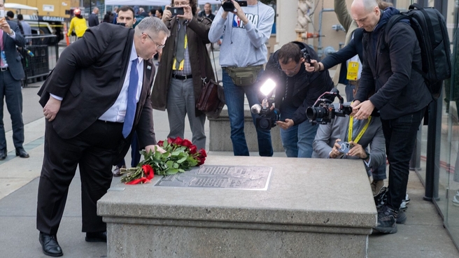 Alexei Overchuk laid flowers at a memorial plaque on the Embarcadero waterfront that commemorates sailors of cruisers from the Russian Imperial Navy’s Pacific Squadron, killed while putting out a fire in San Francisco on 23 October 1863