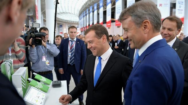 During a tour of the Sochi-2014 International Investment Forum’s display stands  with German Gref, CEO of Sberbank Russia