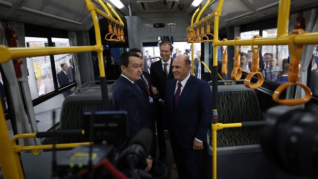 Mikhail Mishustin and Prime Minister of Kazakhstan Alikhan Smailov tour INNOPROM 2022. Reviewing the first prototype of the Sinara low-floor battery electric bus